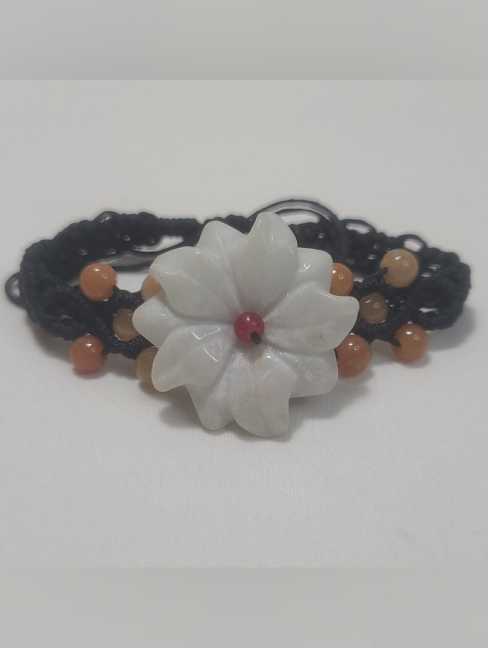 Handcrafted White Floral Jade Bracelet with Red Accent